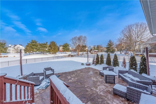 view of snow covered patio