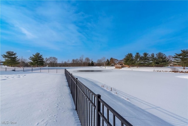 view of yard layered in snow