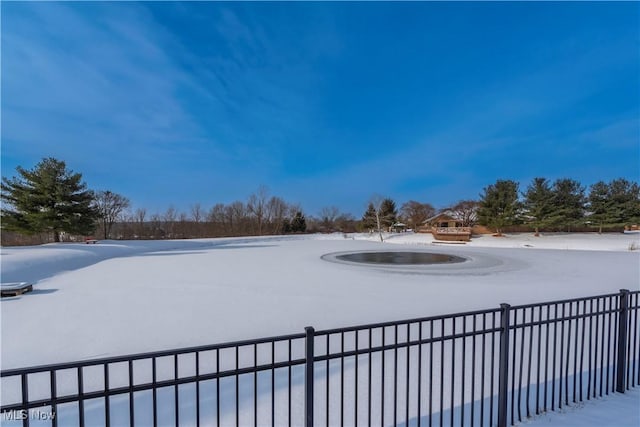 view of yard covered in snow