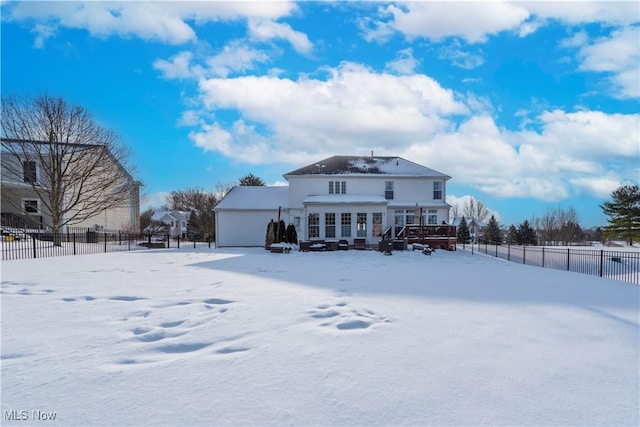 view of snow covered property