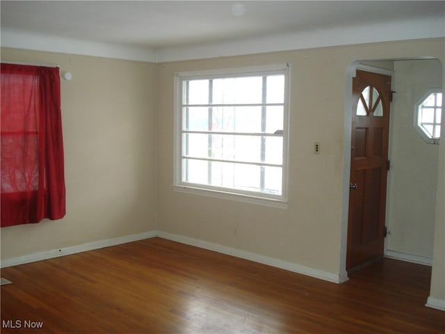 entryway with hardwood / wood-style floors