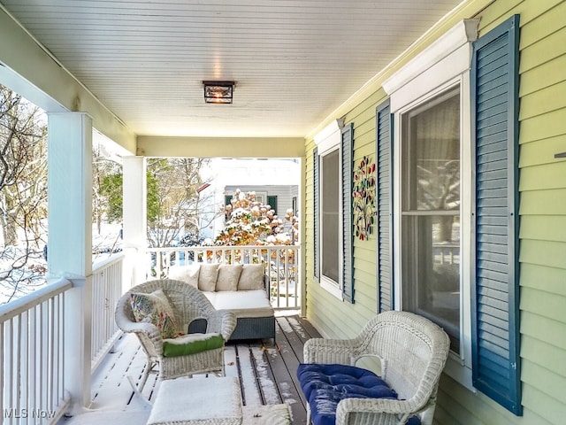 balcony featuring covered porch