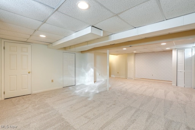 basement with carpet flooring