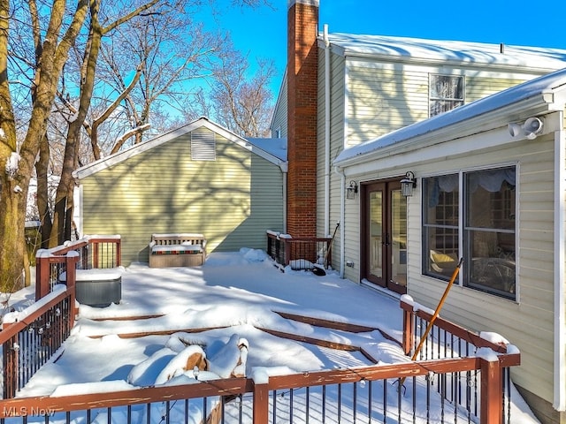 view of snow covered deck