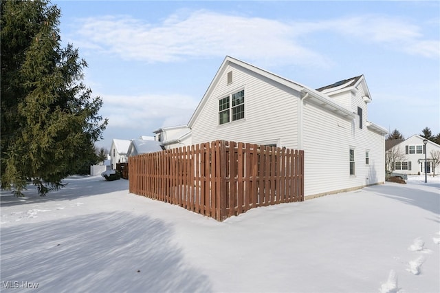 view of snow covered property