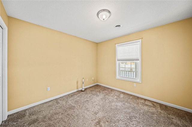 view of carpeted spare room