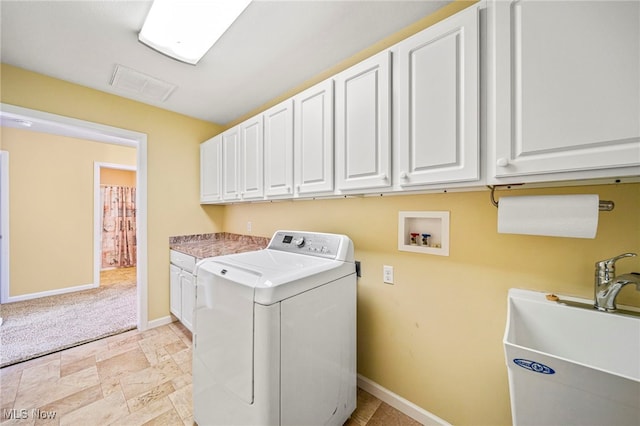 laundry area with washer / clothes dryer, sink, and cabinets