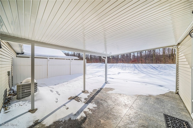 snow covered patio with central AC