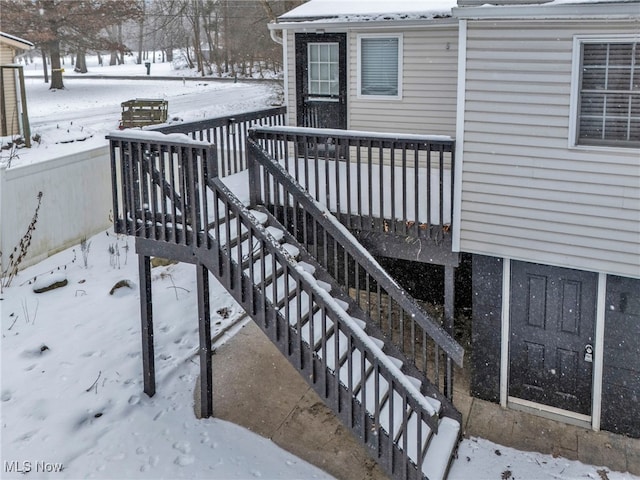 view of snow covered deck