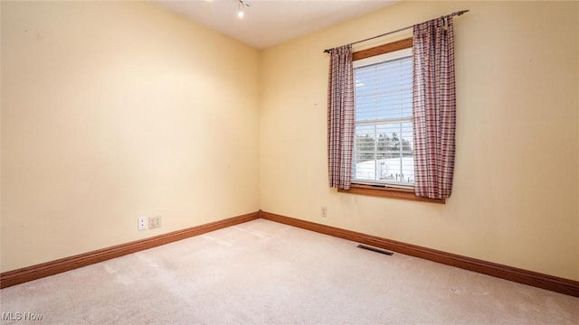 view of carpeted spare room