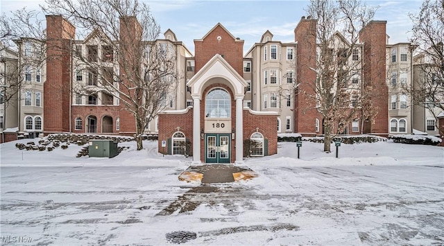 view of snow covered building