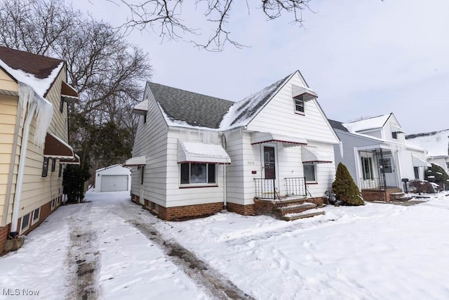 view of front of house featuring an outbuilding and a garage