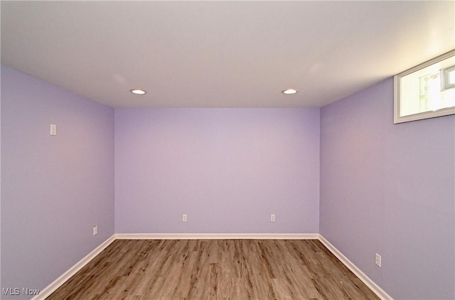 empty room featuring hardwood / wood-style floors