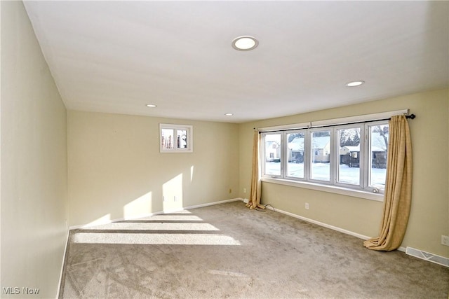 view of carpeted spare room