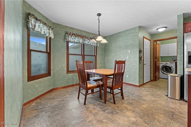 dining room featuring washer / dryer