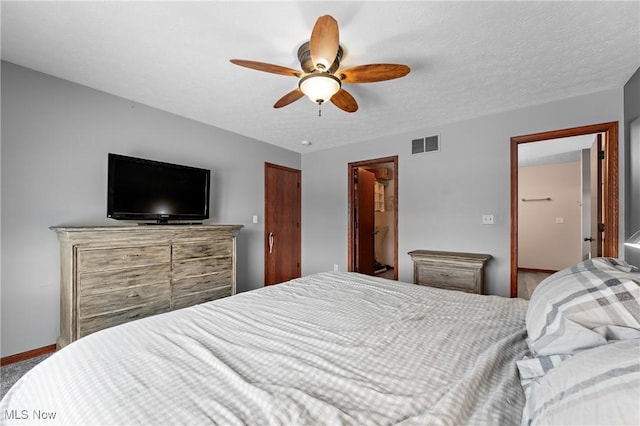 bedroom featuring ceiling fan and carpet flooring