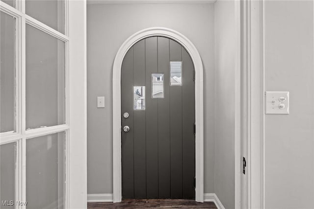 foyer with dark hardwood / wood-style flooring