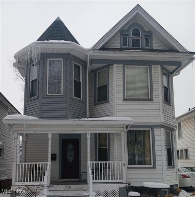 victorian home featuring a porch