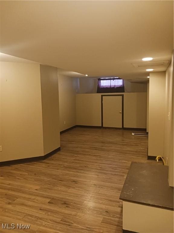 spare room featuring light wood-type flooring