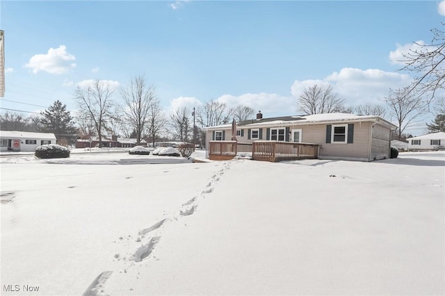 view of front of home with a wooden deck