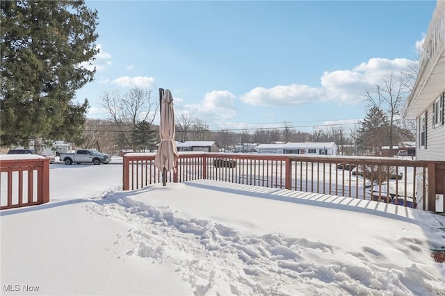 view of snow covered deck