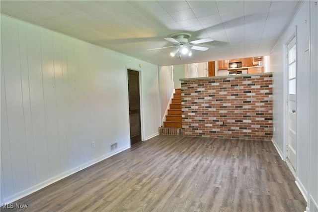 spare room with ceiling fan and light hardwood / wood-style flooring