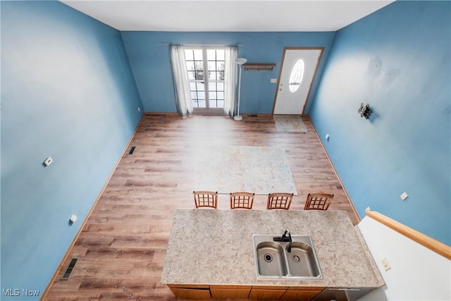 interior space with light hardwood / wood-style floors