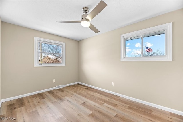 unfurnished room featuring ceiling fan and light hardwood / wood-style floors