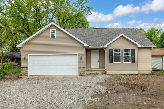24326 Mastick Rd, North Olmsted, OH 44070 - ranch-style home featuring driveway, a shingled roof, and an attached garage