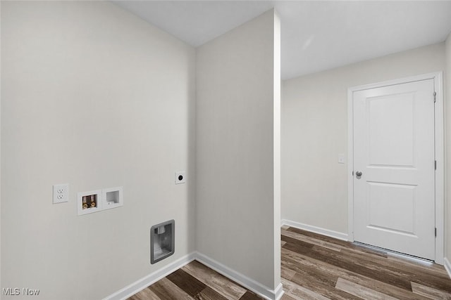 24326 Mastick Rd, North Olmsted, OH 44070 - washroom featuring hookup for an electric dryer, wood finished floors, baseboards, and hookup for a washing machine