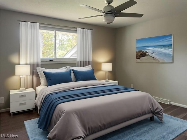 bedroom with dark wood-type flooring and ceiling fan