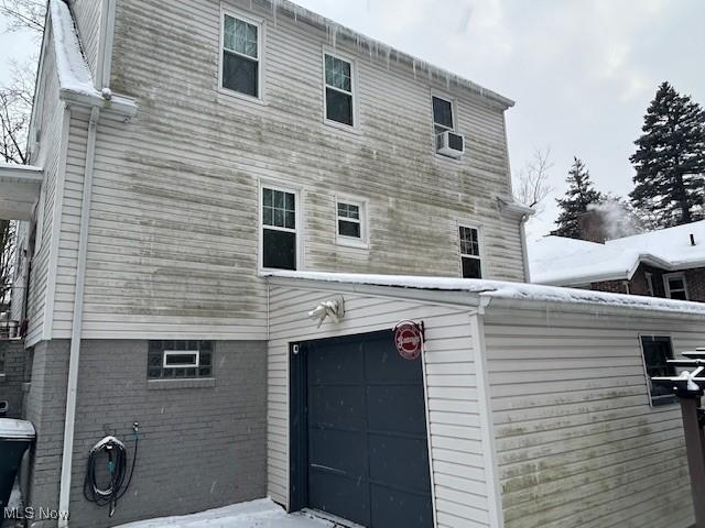 exterior space featuring a garage