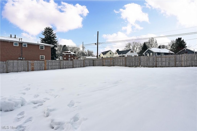 view of snowy yard