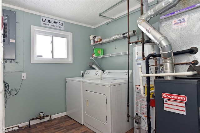 clothes washing area with washing machine and clothes dryer, gas water heater, ornamental molding, dark hardwood / wood-style floors, and electric panel