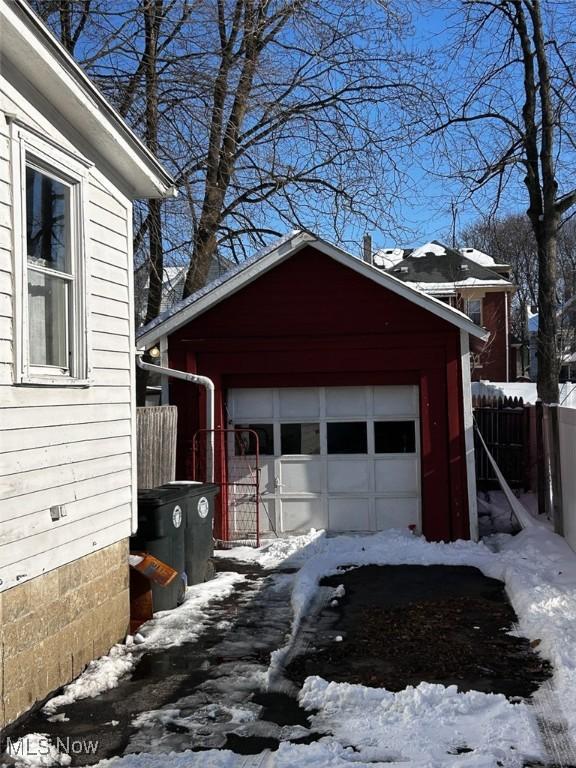 view of snow covered garage