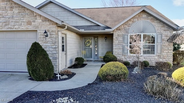 doorway to property featuring a garage