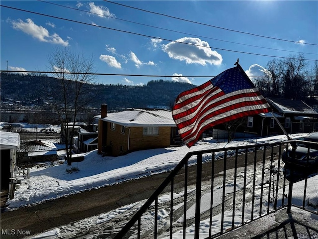 view of snow covered deck