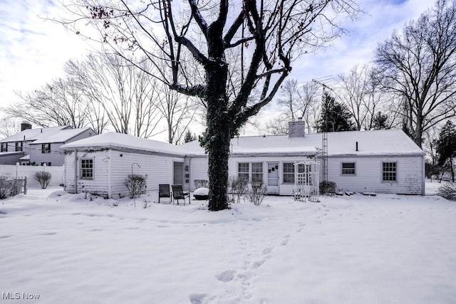 view of snow covered property