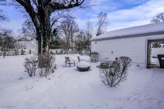 view of yard covered in snow