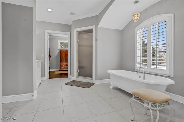 bathroom with crown molding, plus walk in shower, and tile patterned flooring