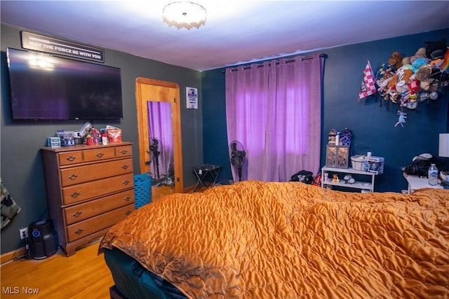 bedroom featuring hardwood / wood-style flooring