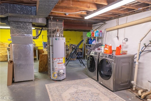 basement featuring separate washer and dryer, gas water heater, and heating unit