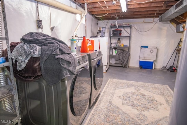 laundry room with independent washer and dryer