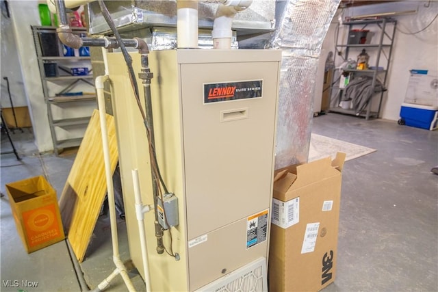 utility room with heating unit