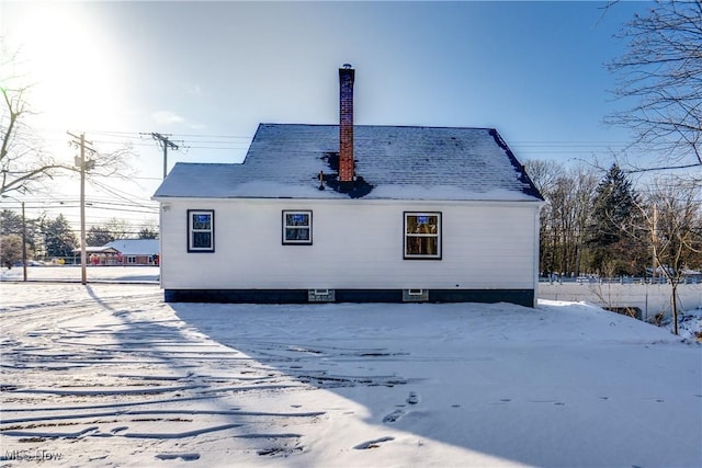 view of snow covered property