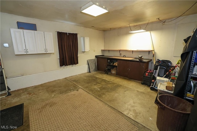 basement with a workshop area