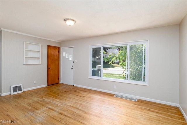 entrance foyer with light wood-type flooring