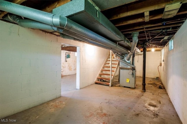 basement featuring heating unit