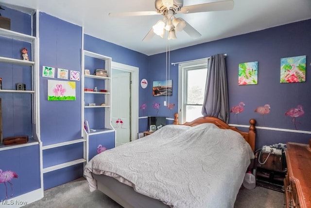 bedroom featuring ceiling fan and carpet flooring