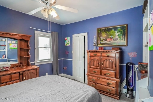 bedroom with carpet flooring and ceiling fan